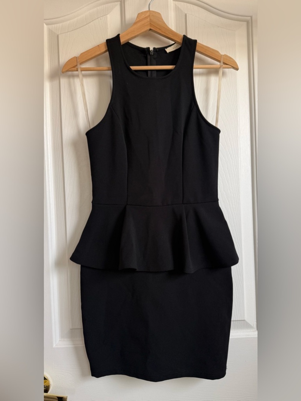 Lush Black Sleeveless Peplum Mini Dress